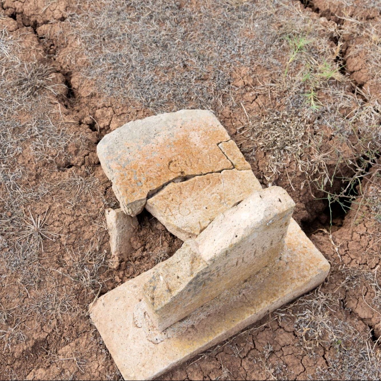 Pre-Restoration of Juan Guadat's gravestone in 2023