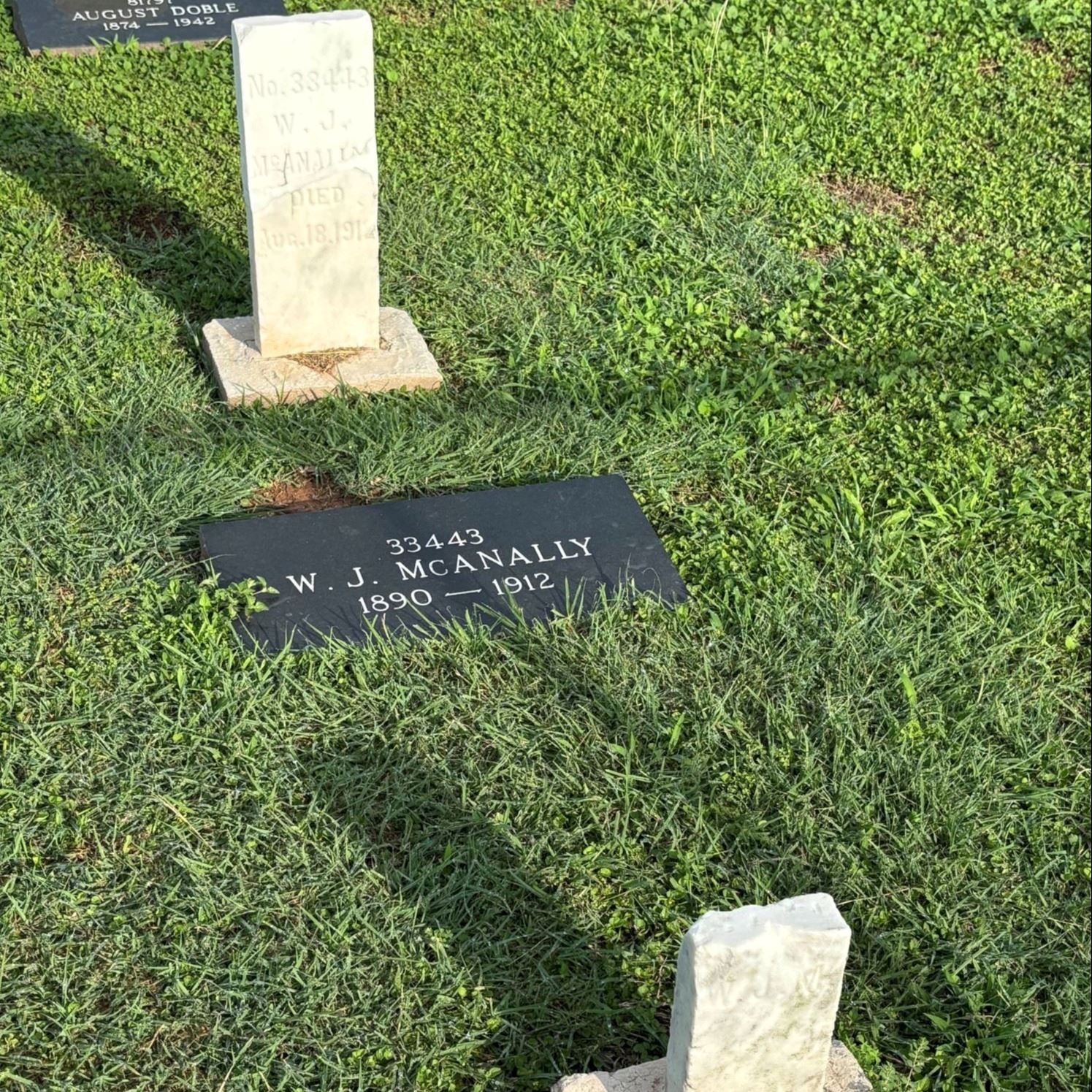 Post-Restoration of W. J. McAnally's gravestone and pillow marker in 2023