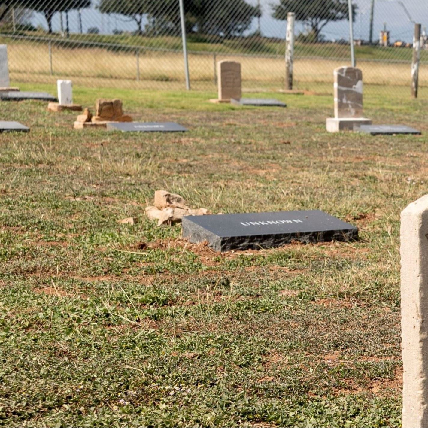 Post-Restoration of Unknown (Grave 36) gravestone and pillow marker in 2023